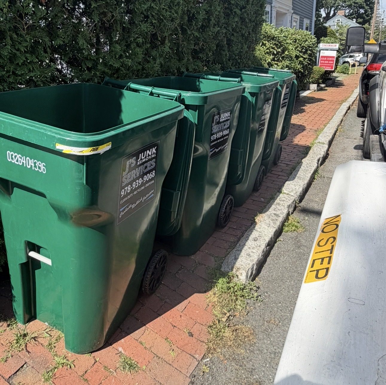 J’s Junk Services curbside trash collection barrels in Beverly MA